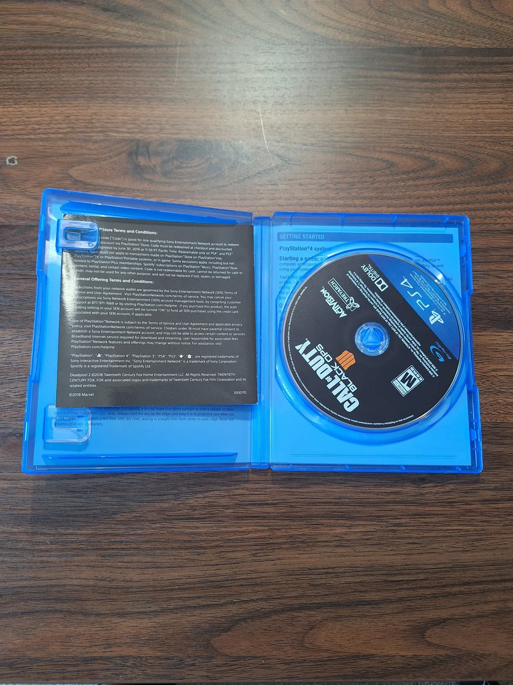 Sony PS4 Controller with Black Finish and Blue Game Cases Bundle